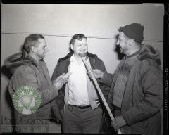 Ray Kolledge Measures Bill Birney's Whiskers. Glenwood, Minnesota