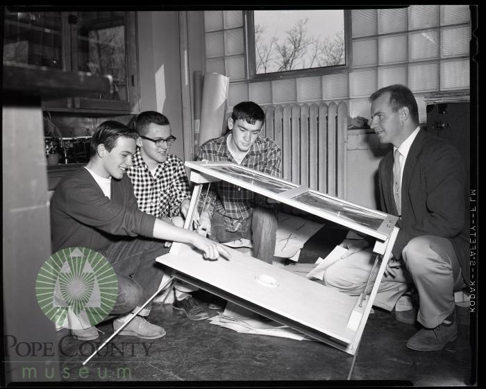 Juniors Explain Solar Furnace to Instructor Harold Palm. Glenwood, Minnesota