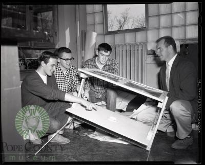 Juniors Explain Solar Furnace to Instructor Harold Palm. Glenwood, Minnesota