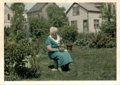 Bertha Dreyer in her garden, 3704 Colorado Ave
