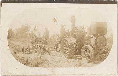 road building with steam engine and grader