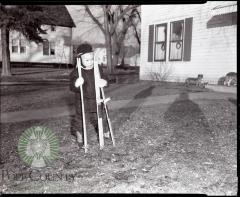 Billy Lee receives new skis for Christmas, Glenwood, Minnesota