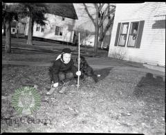 Billy Lee receives new skis for Christmas, Glenwood, Minnesota
