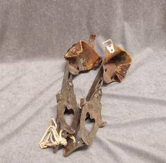 Clip on ice skates with leather heel.