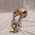 Clip on ice skates with leather heel.
