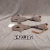 Pair of clip-on ice skates.