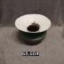 Cast iron and ceramic spittoon.
