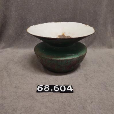 Cast iron and ceramic spittoon.
