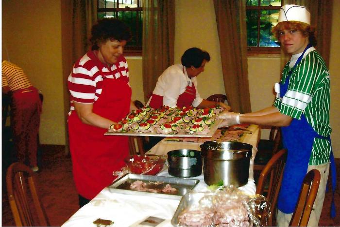 Color Photograph - Lizzia Kohler serving Danish sandwiches