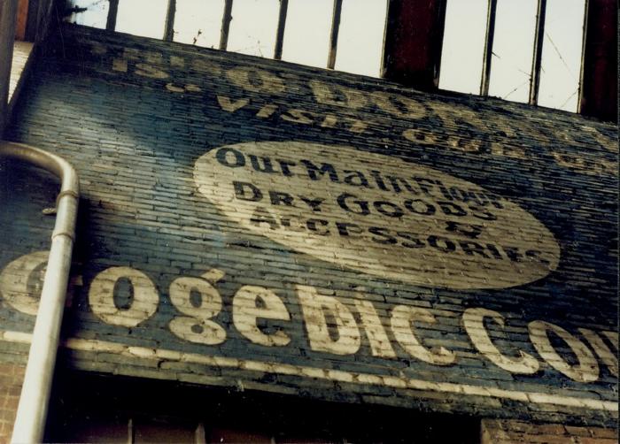 Sign painted on a brick wall