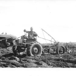 Photo of Charles Kramer on his Allis Chalmers tractor 