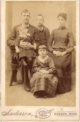 Black and white studio photograph of Mayhew Family