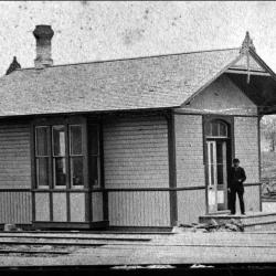 Charles Burwell next to Mill Office