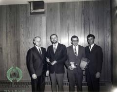 Dick Kaus and Marv Bodeker Receiving Jaycee Awards From Dr. Howard Lecander And Lanny Barsness. 