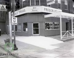 View of the newly remodeled and enlarged corner drug in Glenwood MN 1966