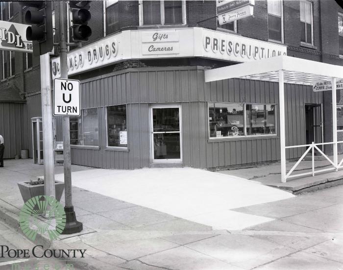 View of the newly remodeled and enlarged corner drug in Glenwood MN 1966
