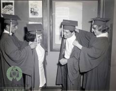Eddie Sievert and Linda Zubke Helping classmates Susan Chan and Raymond Ogdahl