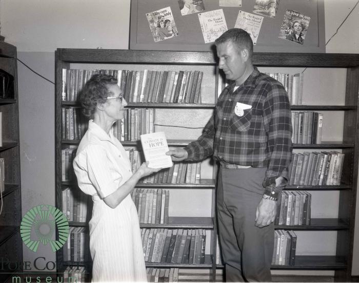 Bob O'Fallon Presenting "The Climate Is Hope" Book to Irene Serrin 