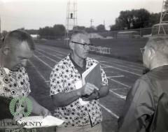 Cliff Hanson with 2 unidentified men during Glenwood track meet 