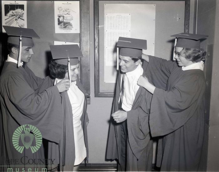 Eddie Sievert and Linda Zubke Helping classmates Susan Chan and Raymond Ogdahl