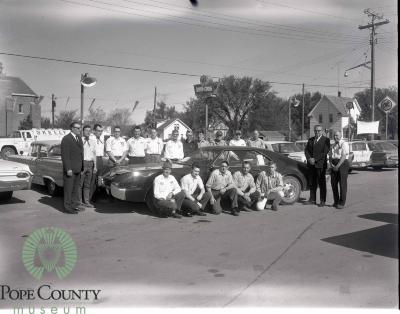  Harvey and Dennis Gloege at the Gloege Chevrolet 20th anniversary with staff