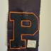 Banner with four letter "P" awarded to Helen Hanke