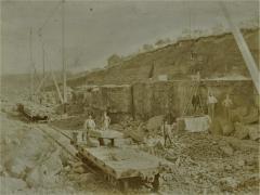 Photograph of Wasioja Quarry, loading limestone on flat cars