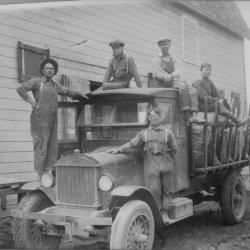 Milaca Dray truck and five men