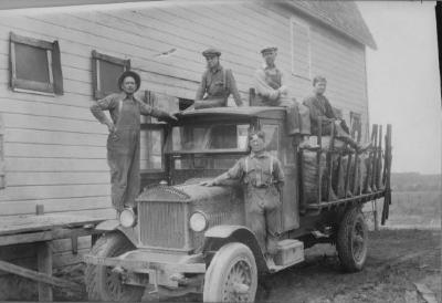 Milaca Dray truck and five men
