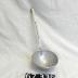 Aluminum straining ladle.
