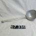 Aluminum straining ladle.