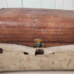 Leather trunk with canvas cover