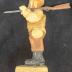 Carving of a Civil War vounteer confederate soldier carrying a musket over his shoulder