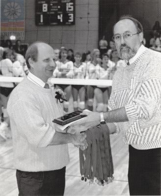 Unknow man receiving award