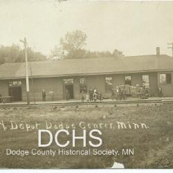 Black and white picture postcard of the Chicago & Great Western Railroad Depot in Dodge Center