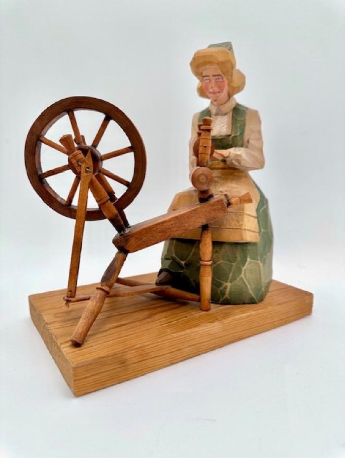 Woman At Spinning Wheel: Wood Carving