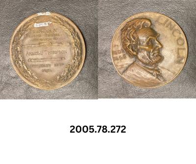 Paperweight - Lincoln Essay Medal awarded to Arnold Thompson
