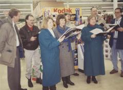 Riverlights Christmas caroling in downtown Saint Peter, 1993.