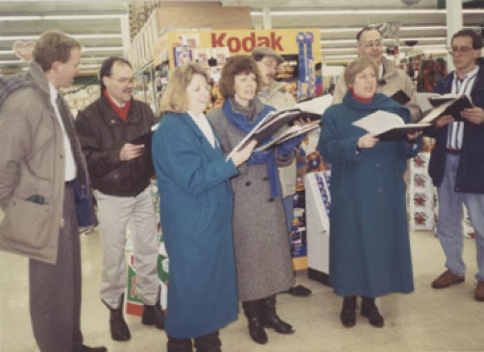 Riverlights Christmas caroling in downtown Saint Peter, 1993.