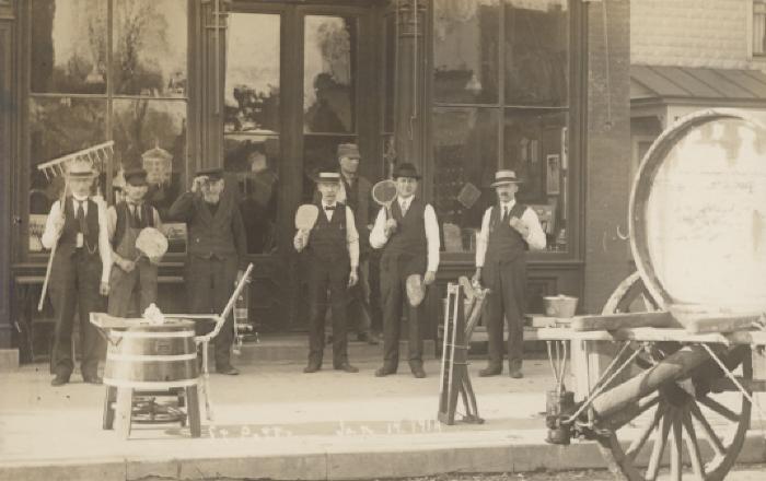 Men in front of Nutter Hardware Store