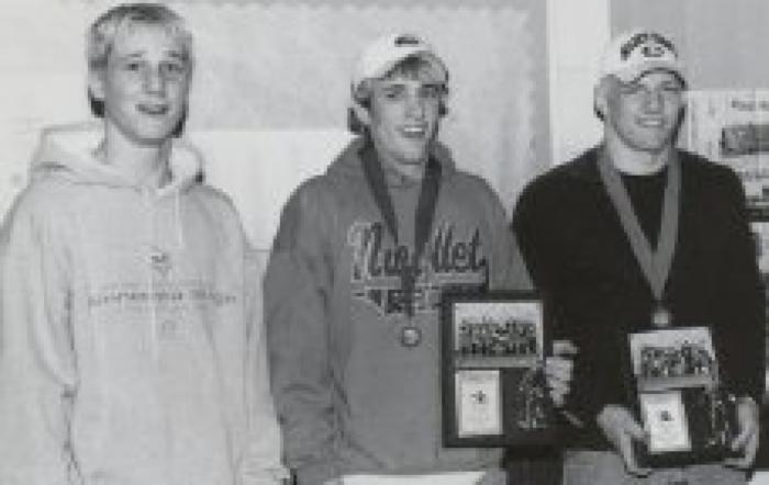 Two Nicollet, MN Medal Winners at the State Wrestling Tournament with Plaques; 2002