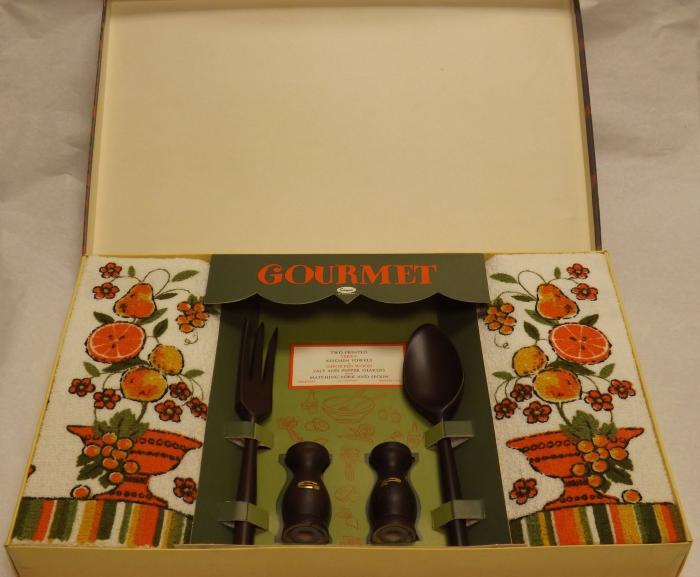 Box containing a Kitchen Serving Set - (kitchen towels, salt/pepper shakers, for & salad tongs), Lorraine Coller, Shakopee, 1965