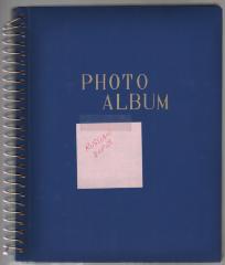 Empty photo album with a blue cover.