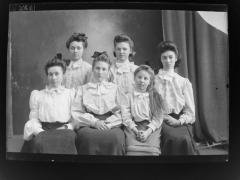 Glass plate negative of 6 seated women