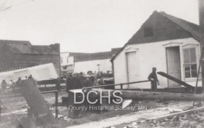 Black and white photograph of building damaged by tornado