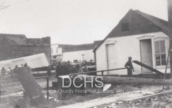 Black and white photograph of building damaged by tornado
