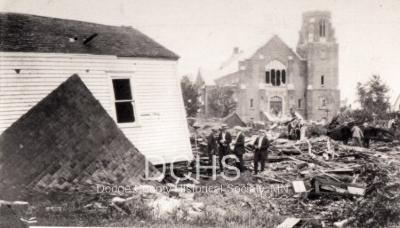 Black and white photograph of debris in front of Trinity Church