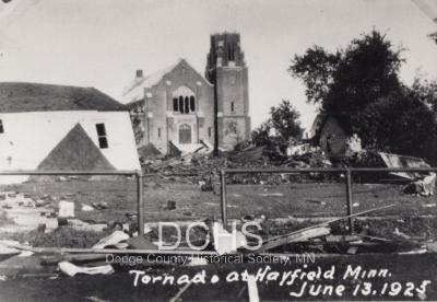 Black and white photograph of debris in front of Trinity Church