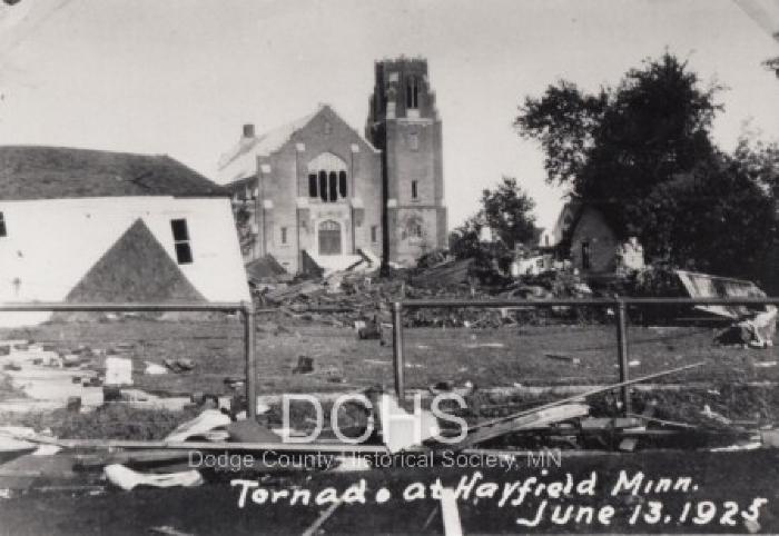 Black and white photograph of debris in front of Trinity Church