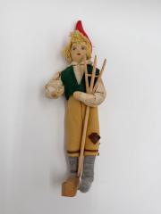 Doll with Rake and Green Vest: Doll
